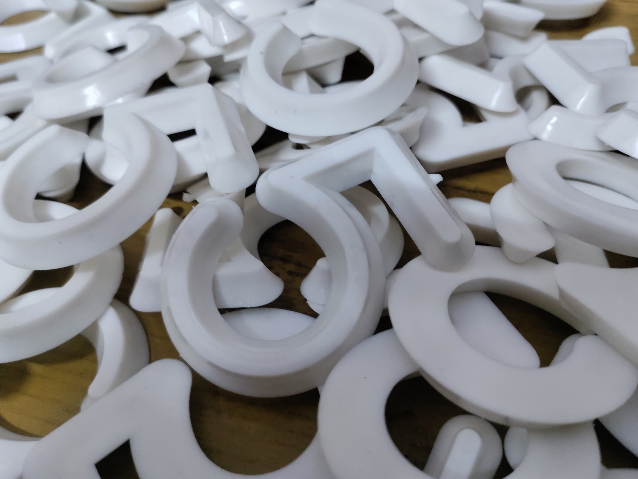 White plastic foundry letters and numbers
